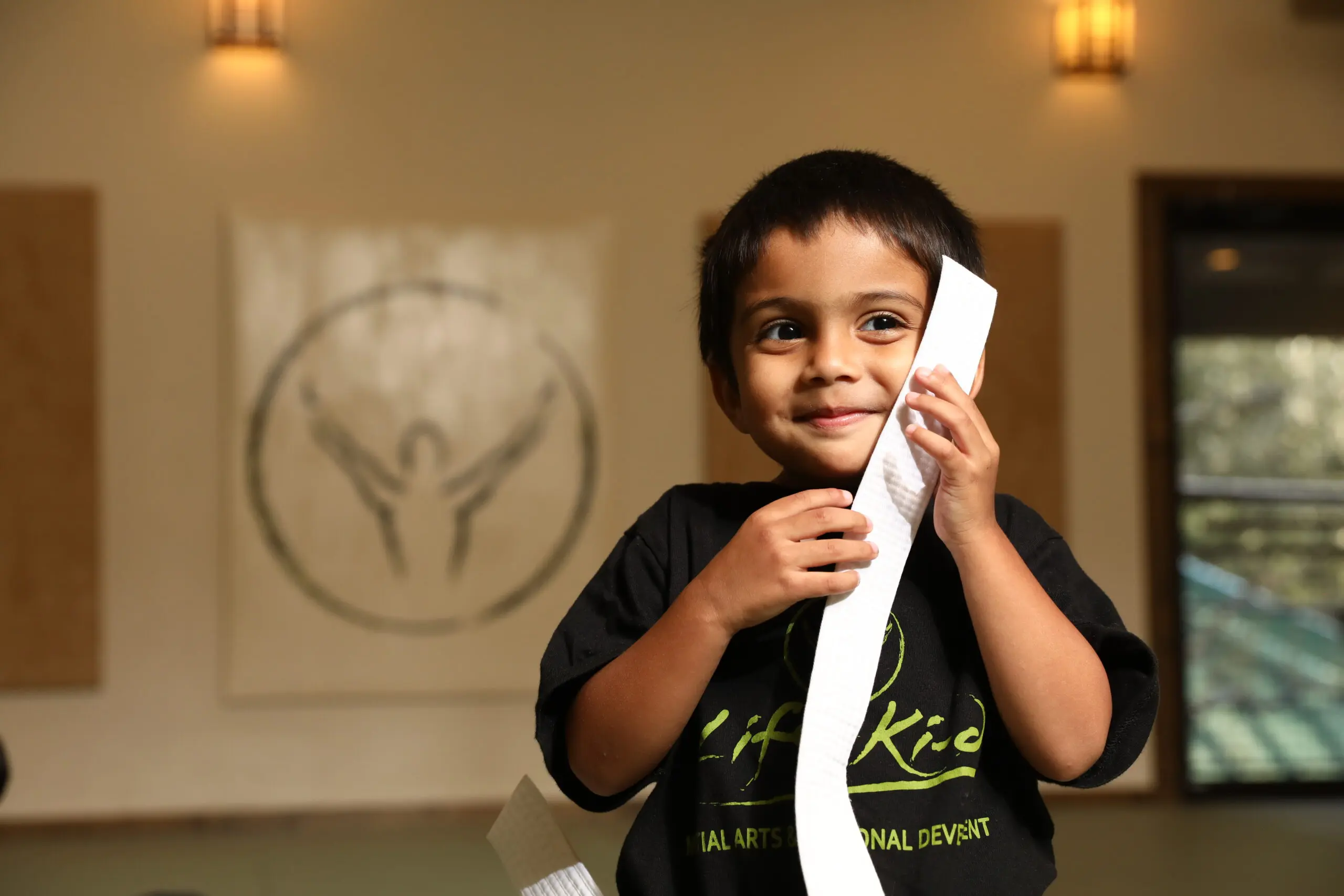 Preschoolers can be taught self-defense training through Krav Maga, a martial arts defense system that helps them develop physical skills and practice essential techniques.