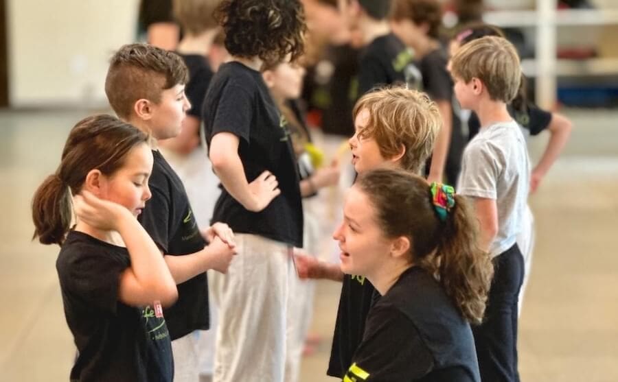 kids building self-defense skills through martial arts