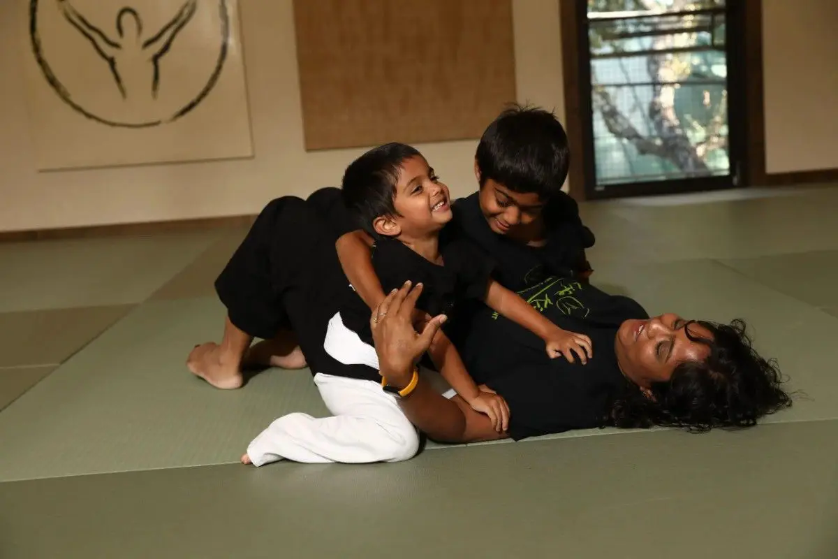 Children learning BJJ self-defense techniques during Brazilian Jiu-Jitsu class