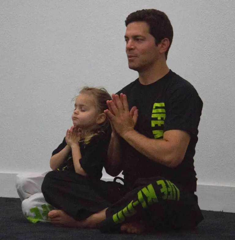 instructor and student doing systema practices